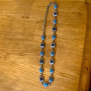 Antique neckace. Light and dark blue gems. With beutiful designs.